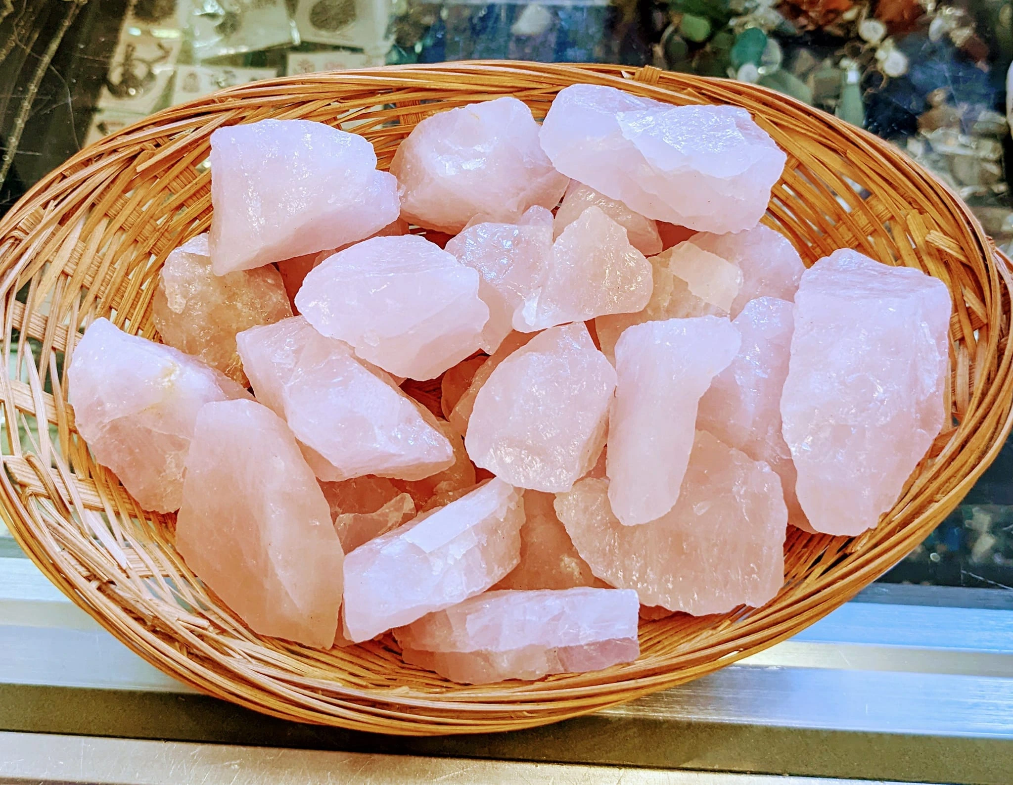 A bowl of rough cut rose quartz