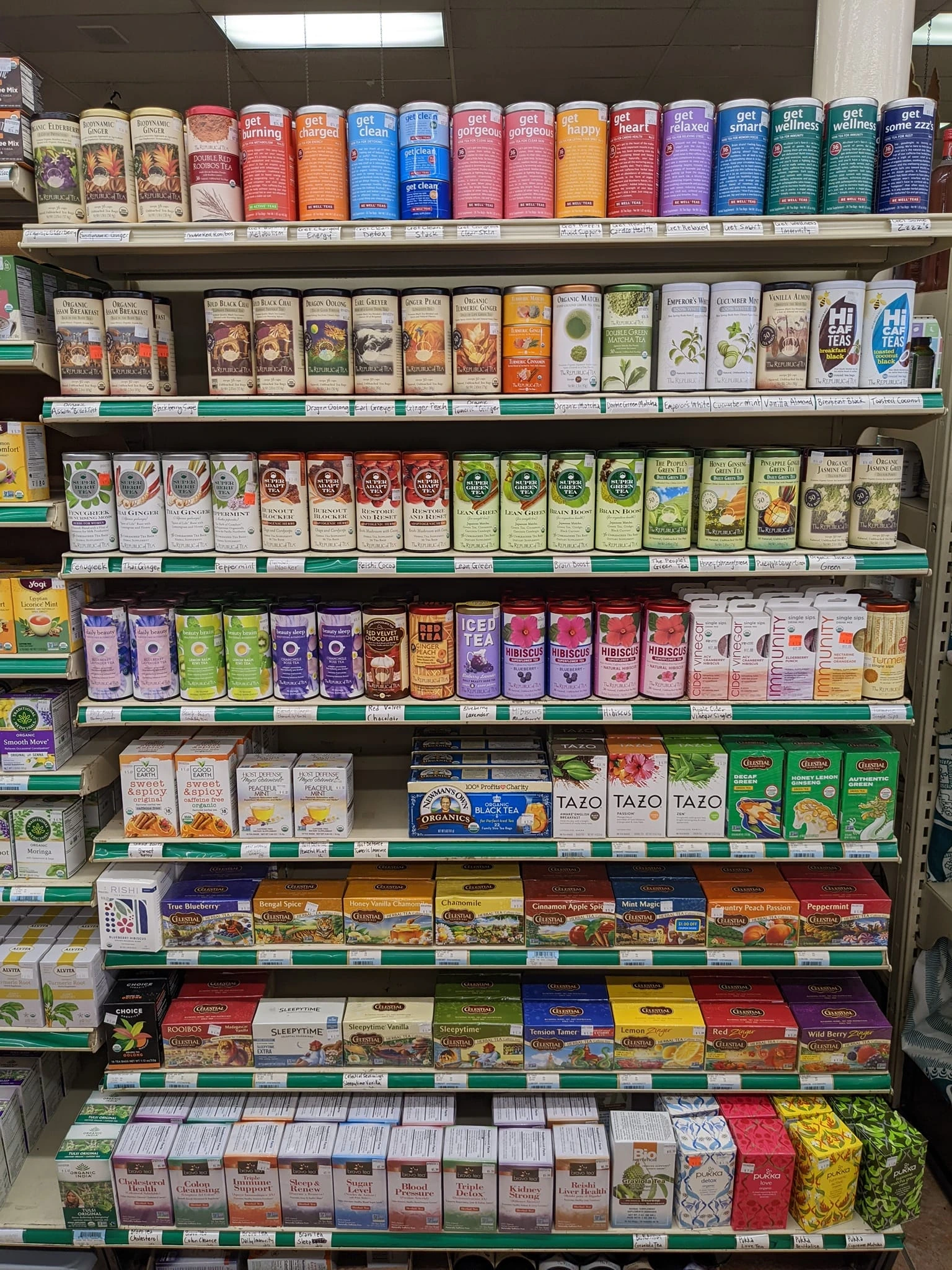 A shelf of packaged tea