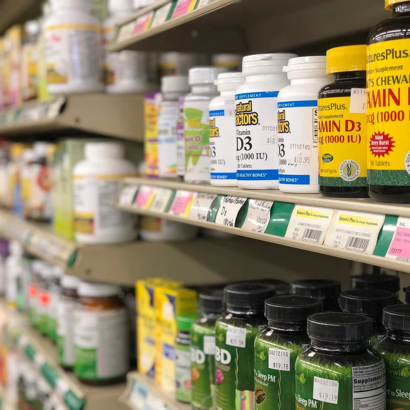 A shelf of vitamins and supplements